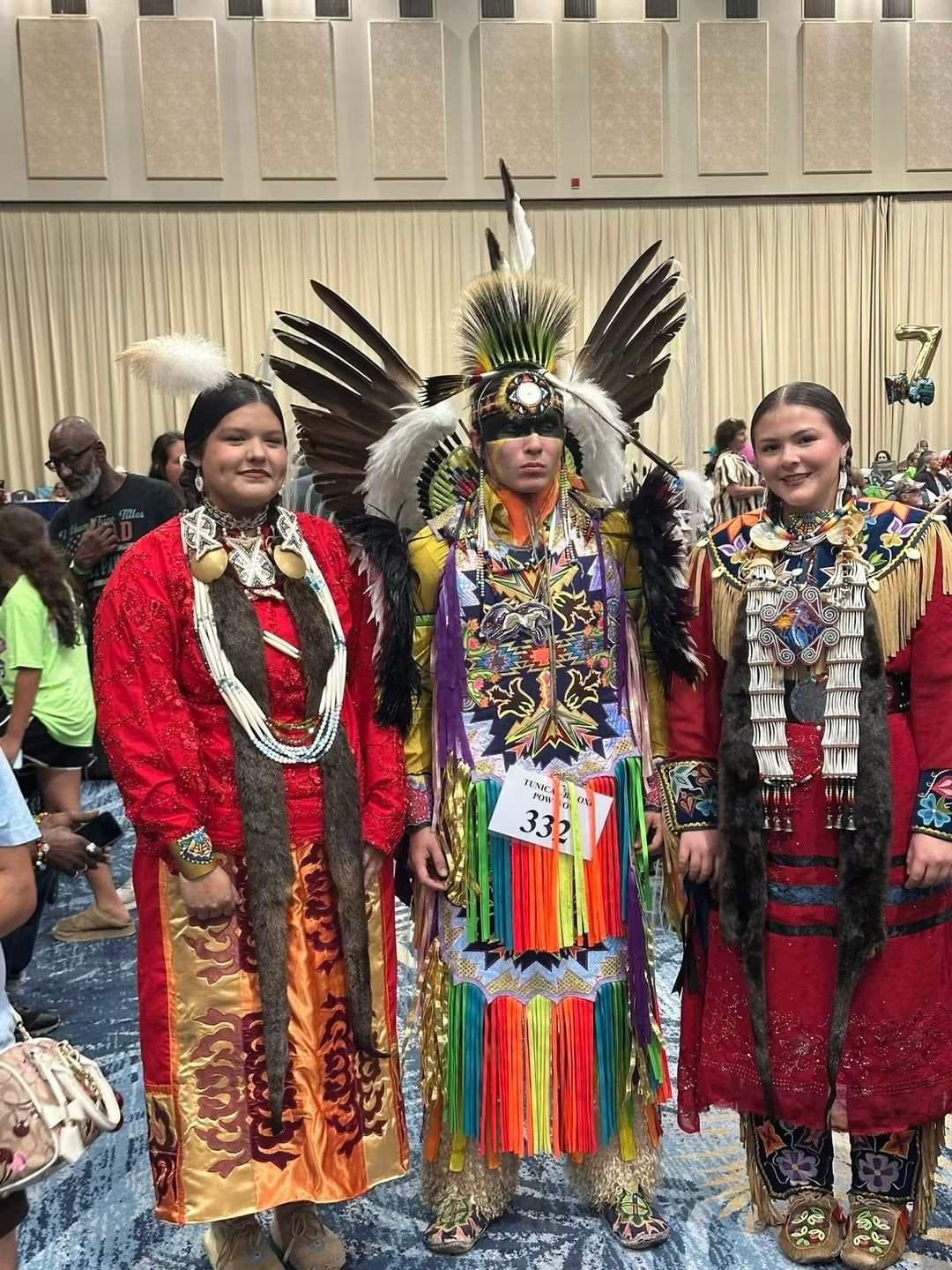 Tribal dancers in regalia at the powwow